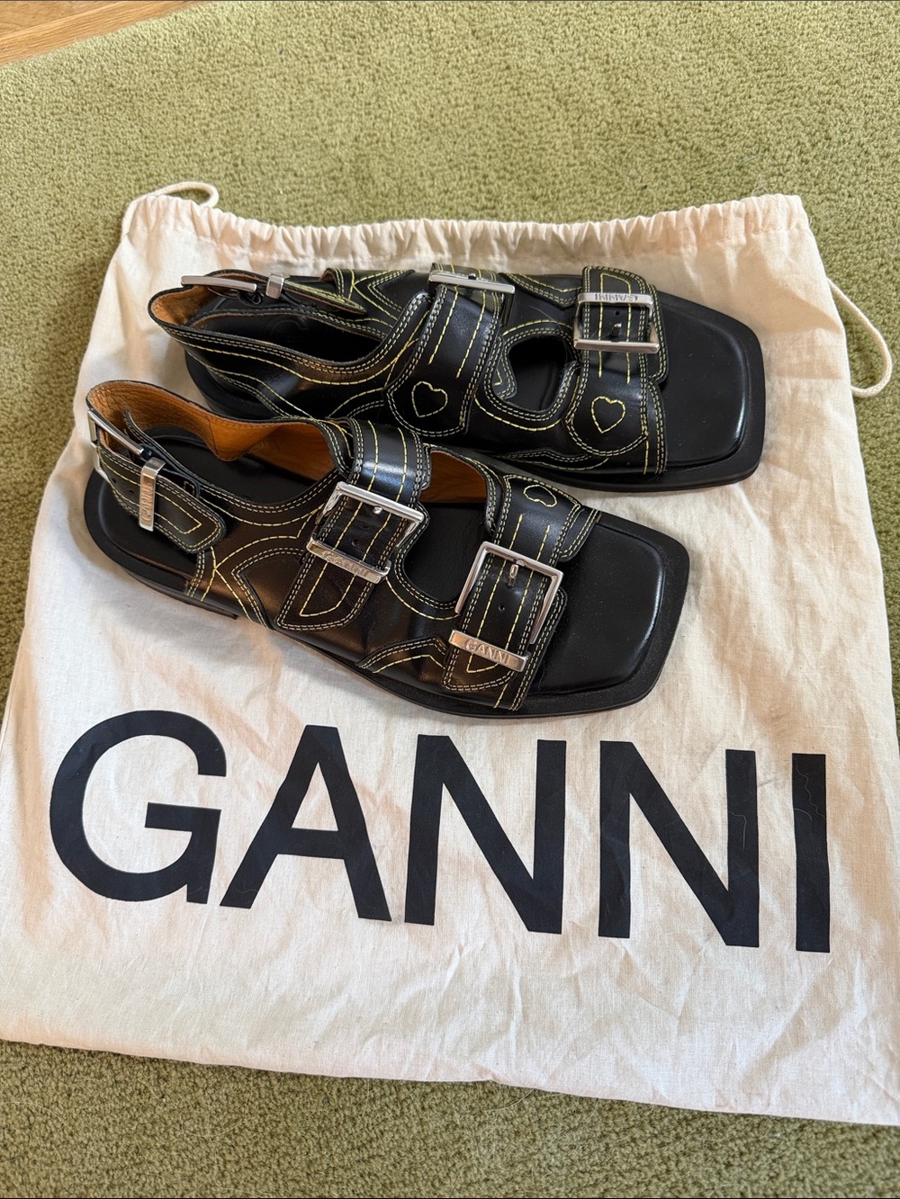 Ganni Black Leather Triple-Buckle Sandals with Heart Stitching
